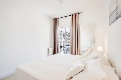 Cama o camas de una habitación en Apartamento Condal 2