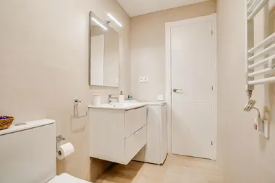 Un baño de Apartamento Condal 2