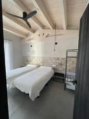 Cama o camas de una habitación en Casa Palma Pals 1