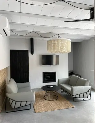 Una televisión o centro de entretenimiento en Casa Palma Pals 1