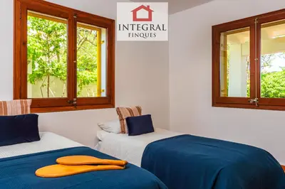 Cama o camas de una habitación en La Masia de la Fosca