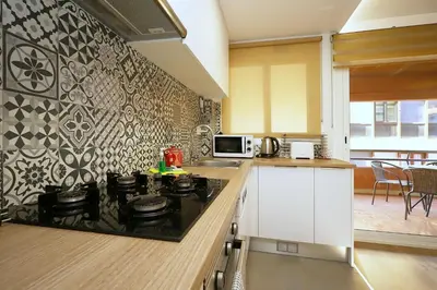 Una cocina o zona de cocina en Domus