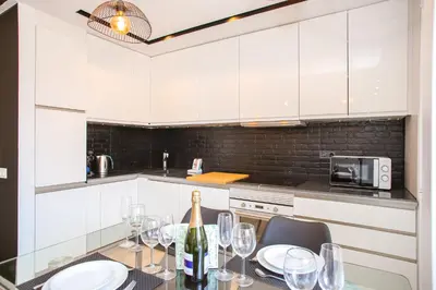Una cocina o zona de cocina en AL39 - Atico con barbacoa playa Fenals