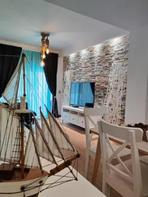 Una televisión o centro de entretenimiento en Sea you soon apartment. Lloret de Mar city center