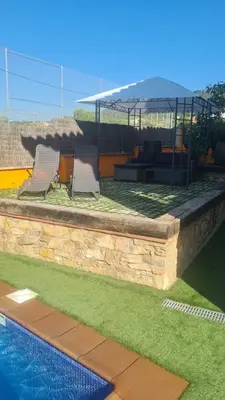 Piscina en o cerca de Casa rustica con piscina y jardin