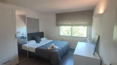 Cama o camas de una habitación en VILLAS COSETTE Apartamento Plaza Europa