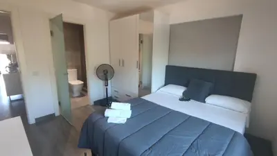 Cama o camas de una habitación en VILLAS COSETTE Apartamento Plaza Europa