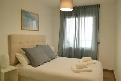 Cama o camas de una habitación en RECONNECTAR Malgrat de Mar Garbí I