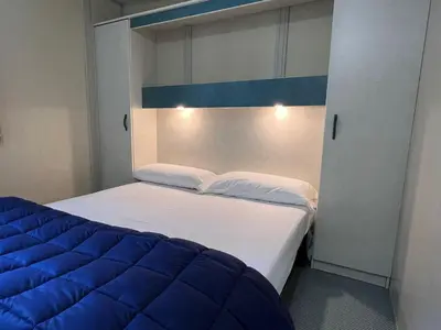 Cama o camas de una habitación en Camping Turismar