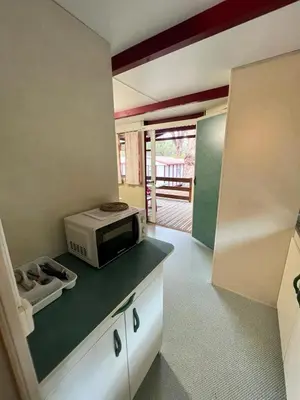 Una televisión o centro de entretenimiento en Camping Turismar