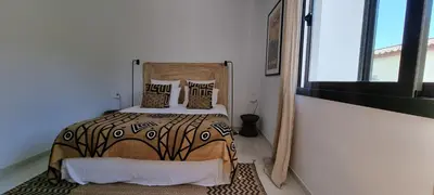 Cama o camas de una habitación en Casa Blanca
