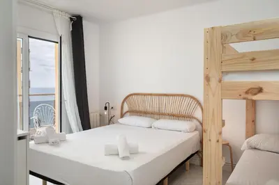 Cama o camas de una habitación en Flateli Blanes Vista Mar