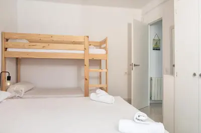 Cama o camas de una habitación en Flateli Blanes Vista Mar