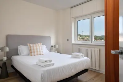 Cama o camas de una habitación en Flateli Penthouse Jaume I