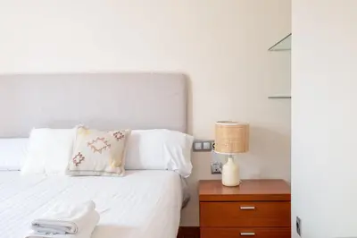 Cama o camas de una habitación en Flateli Penthouse Jaume I
