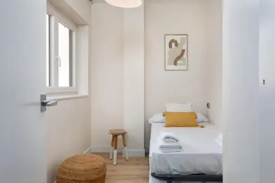 Cama o camas de una habitación en Flateli Penthouse Jaume I