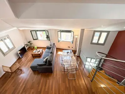 Zona de estar de Loft Cort Reial Atico in the heart of the old town
