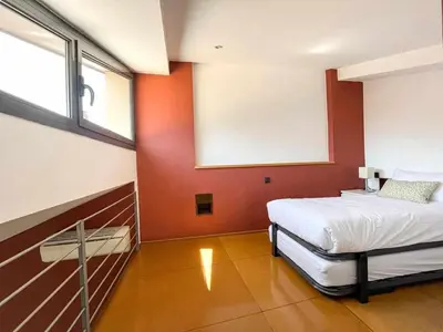 Cama o camas de una habitación en Loft Cort Reial Atico in the heart of the old town