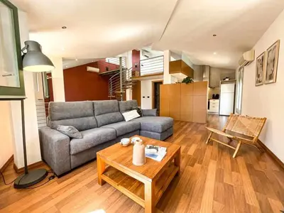 Zona de estar de Loft Cort Reial Atico in the heart of the old town