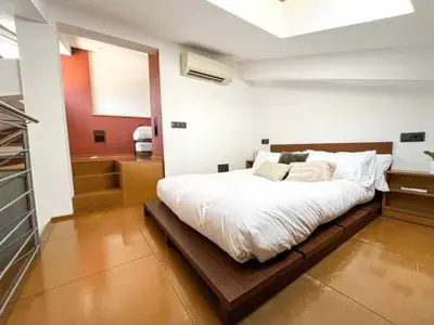 Cama o camas de una habitación en Loft Cort Reial Atico in the heart of the old town