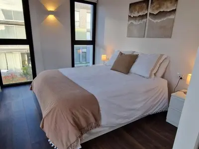 Cama o camas de una habitación en Espectacular piso nuevo con piscina