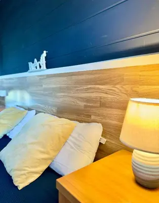 Cama o camas de una habitación en Apartment, short walk to the beach with aircon
