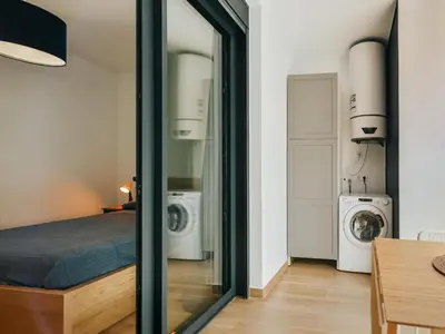 Cama o camas de una habitación en Apartamento Platja Gran Palamós
