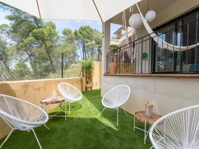 Jardín al aire libre en Brisa del mar Sa Punta duplex piscina y parking