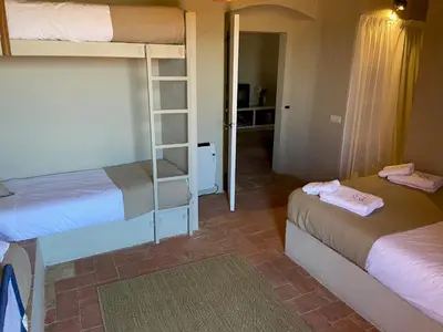 Cama o camas de una habitación en Torre Bertrana By Grup Duquessa