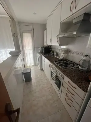 Una cocina o zona de cocina en Apartamento céntrico en Blanes