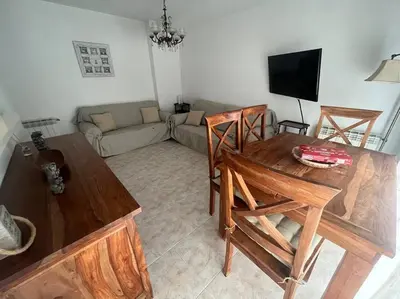 Una televisión o centro de entretenimiento en Apartamento céntrico en Blanes