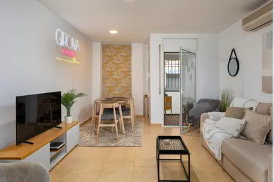 Una televisión o centro de entretenimiento en Carme -Alojamiento céntrico en Girona