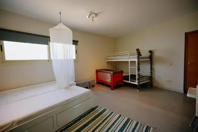 Cama o camas de una habitación en Villa Treehouse by Alvent Holidays