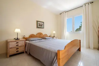 Cama o camas de una habitación en Hauzify I Casa Tamariu