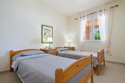Cama o camas de una habitación en Hauzify I Casa Tamariu