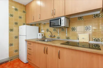 Una cocina o zona de cocina en Apartamento Gloria
