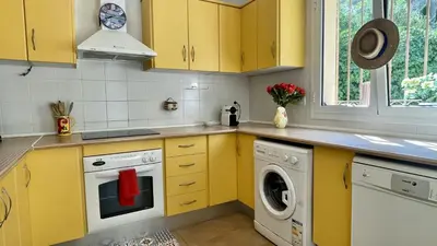 Una cocina o zona de cocina en Villa Pineda 5