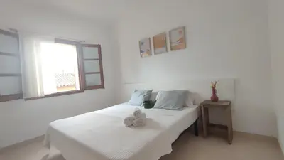 Cama o camas de una habitación en VILLAS COSETTE Villa Brava