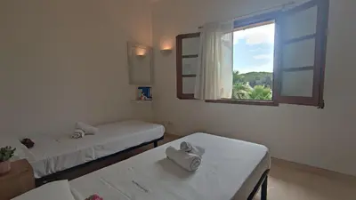 Cama o camas de una habitación en VILLAS COSETTE Villa Brava