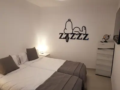 Cama o camas de una habitación en Apartaments L’ARC