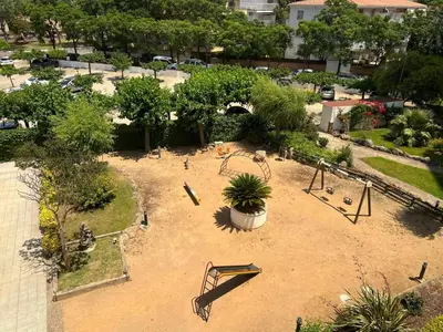 Jardín al aire libre en Apartamento Platja d’Aro · 2 dormitorios con pisci