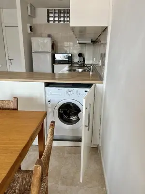Una cocina o zona de cocina en Apartamento Platja d’Aro · 2 dormitorios con pisci