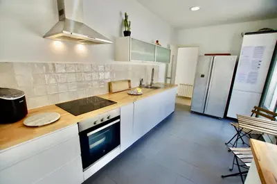 Una cocina o zona de cocina en V&V LLORET- Villa Cinta