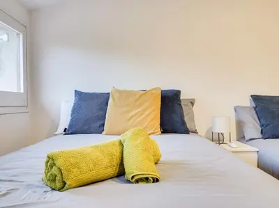 Cama o camas de una habitación en V&VLLORET- Villa Camelia
