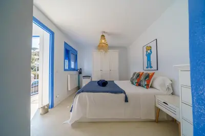 Cama o camas de una habitación en Perla Azul Lux, Vista Mar en Cala Canyelles, Aircon