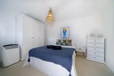 Cama o camas de una habitación en Perla Azul Lux, Vista Mar en Cala Canyelles, Aircon
