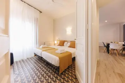 Cama o camas de una habitación en Bravissimo Ciutadans Penthouse, 3-bedroom apartment