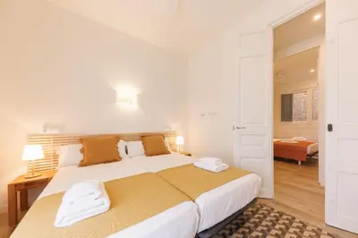 Cama o camas de una habitación en Bravissimo Ciutadans Penthouse, 3-bedroom apartment