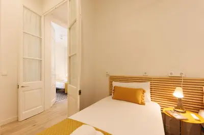 Cama o camas de una habitación en Bravissimo Ciutadans Penthouse, 3-bedroom apartment