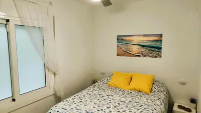 Cama o camas de una habitación en Canet playa y centro con free wifi